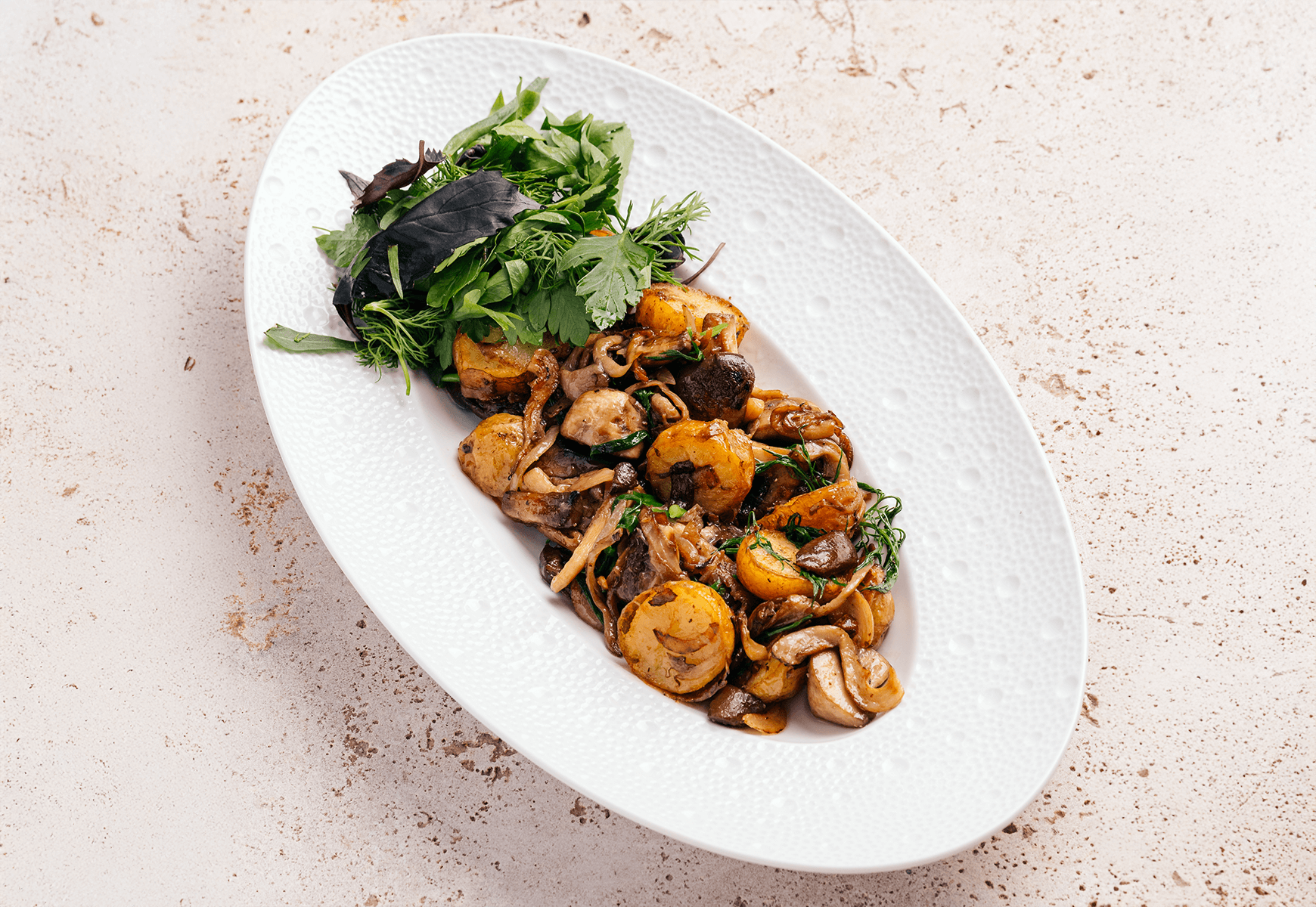 Fried potatoes with mushrooms